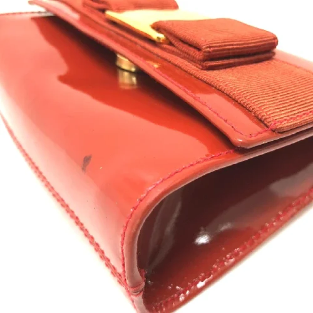 Salvatore Ferragamo Pre-owned Leather pouches Orange Dames