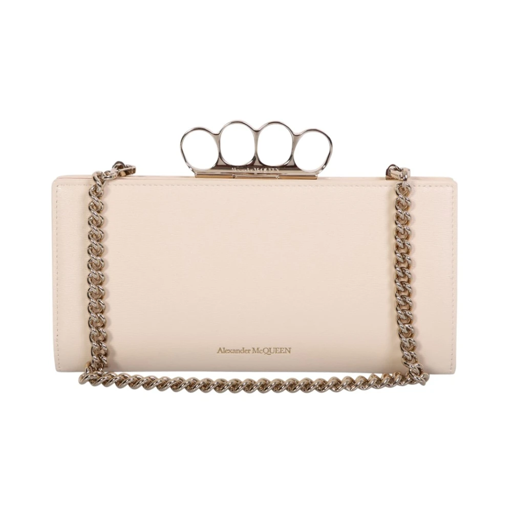 Four Ring Case beige bag by Alexander Mcqueen; innovative, exciting, uncompromising, adjectives that best define the brand style