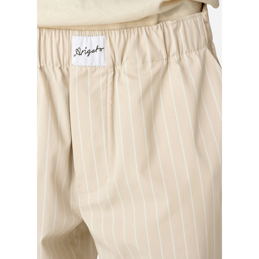Axel Arigato Gestreepte katoenen broek Beige Dames