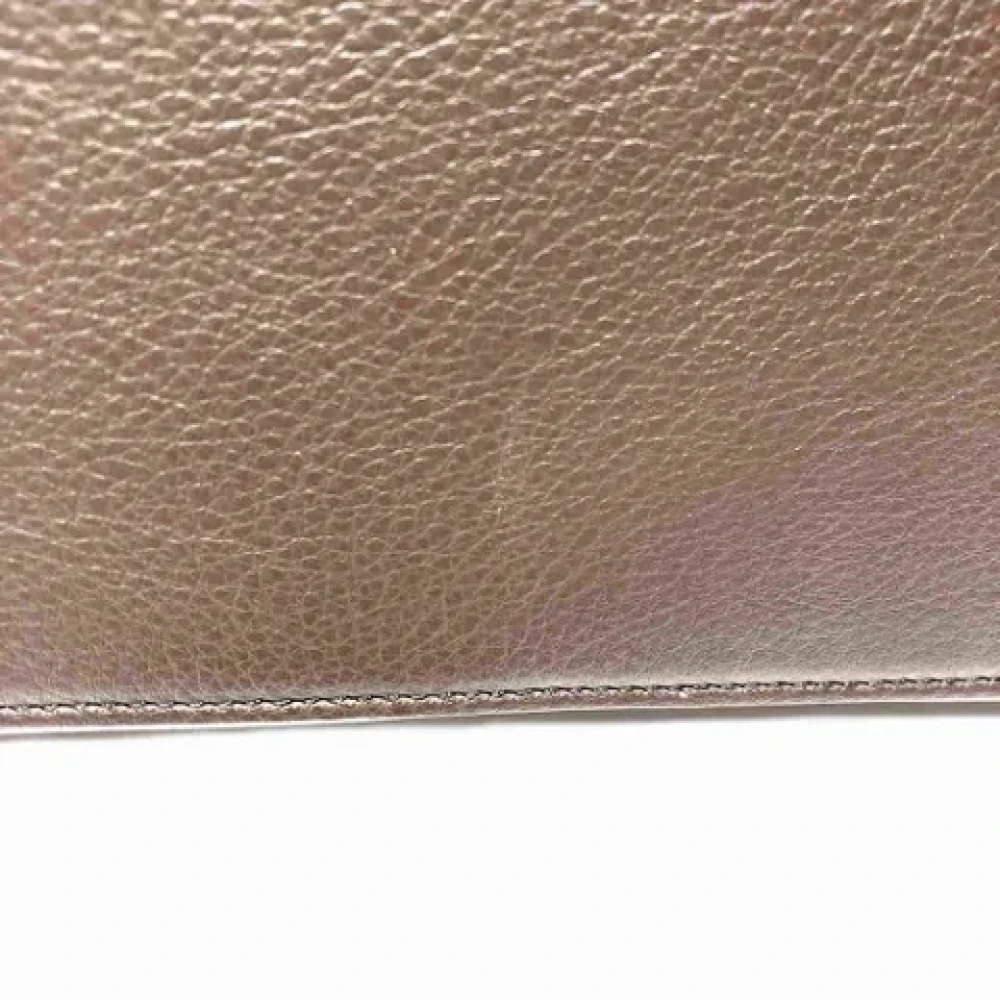 Salvatore Ferragamo Pre-owned Leather clutches Brown Dames