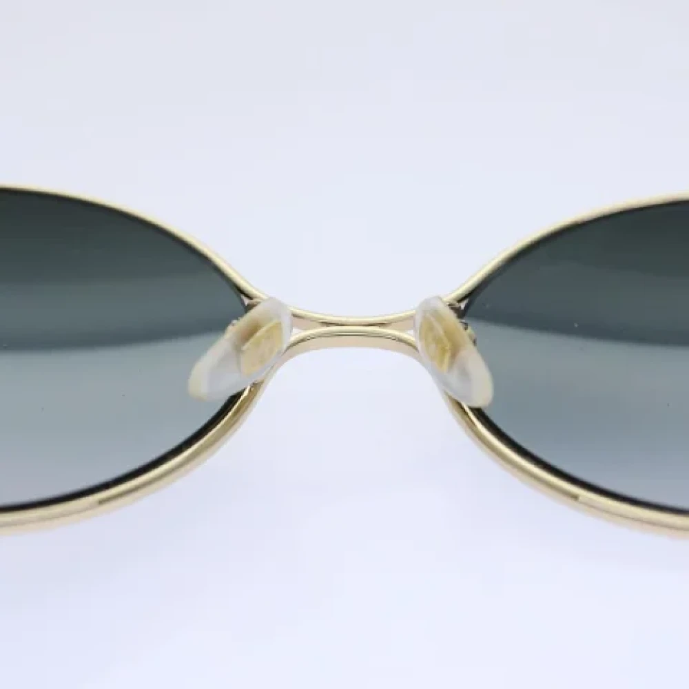 Gucci Vintage Pre-owned Metal sunglasses Yellow Dames
