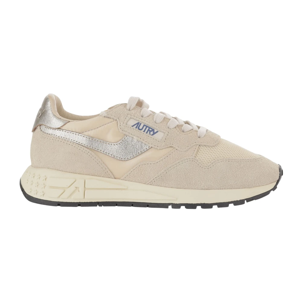 Autry Sneakers made from a leather blend Front lacing Round toe Logo details Tone-on-tone stitching Rubber running sole Contrast padded heel tab Made in Indonesia Composition: 50% nylon- 40% leather- 10% mesh Dames Schoenen Beige