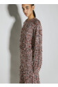pull-a-boucles-avec-fils-laches