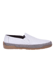 Slip ons in white woven leather