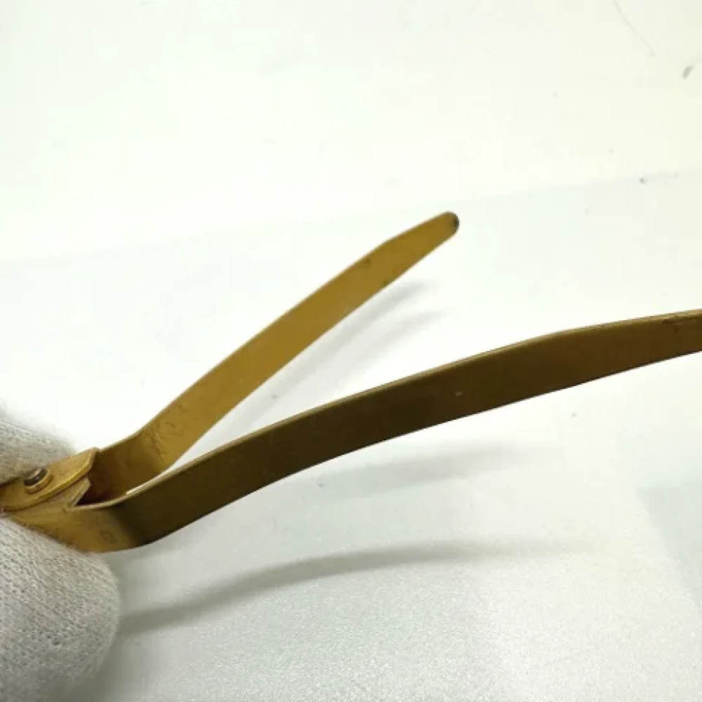 Chanel Vintage Pre-owned Metal hair-accessories Yellow Dames
