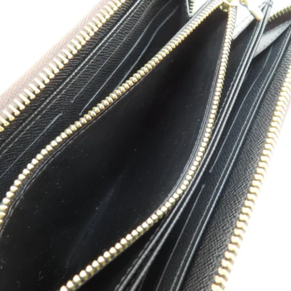 Louis Vuitton Vintage Pre-owned Fabric wallets Brown Dames