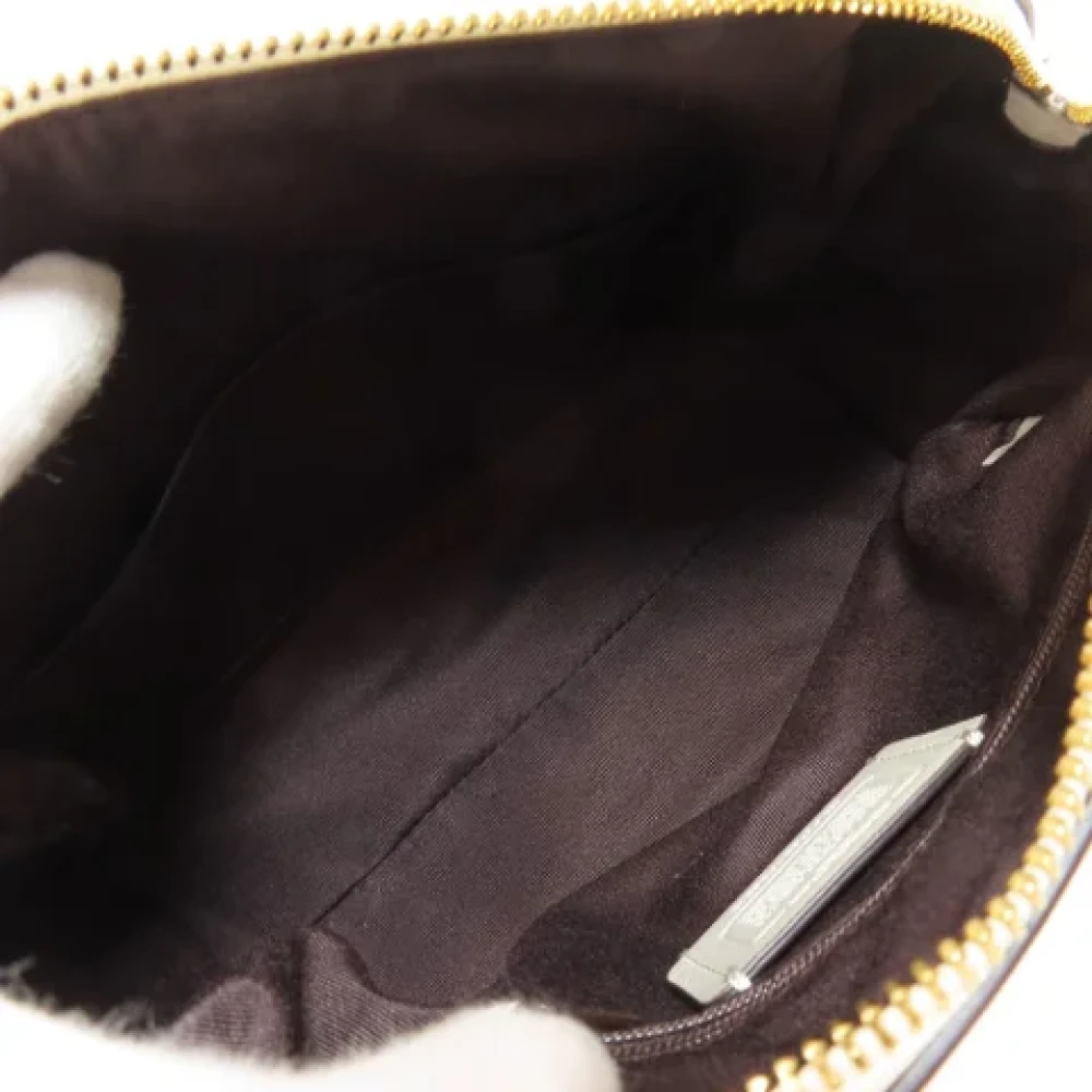 Coach Pre-owned Plastic handbags Beige Dames