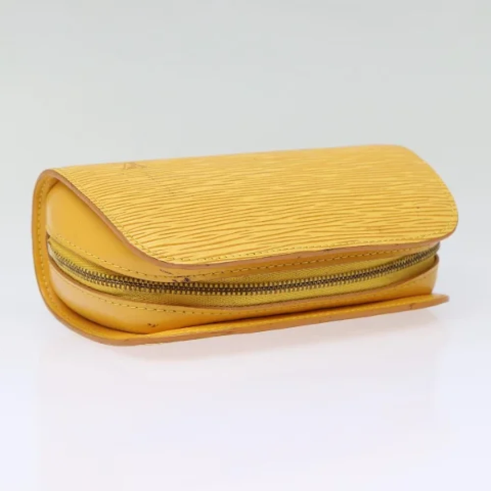 Louis Vuitton Vintage Pre-owned Leather pouches Yellow Dames