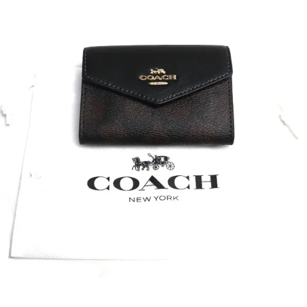 Coach Pre-owned Canvas wallets Brown Dames