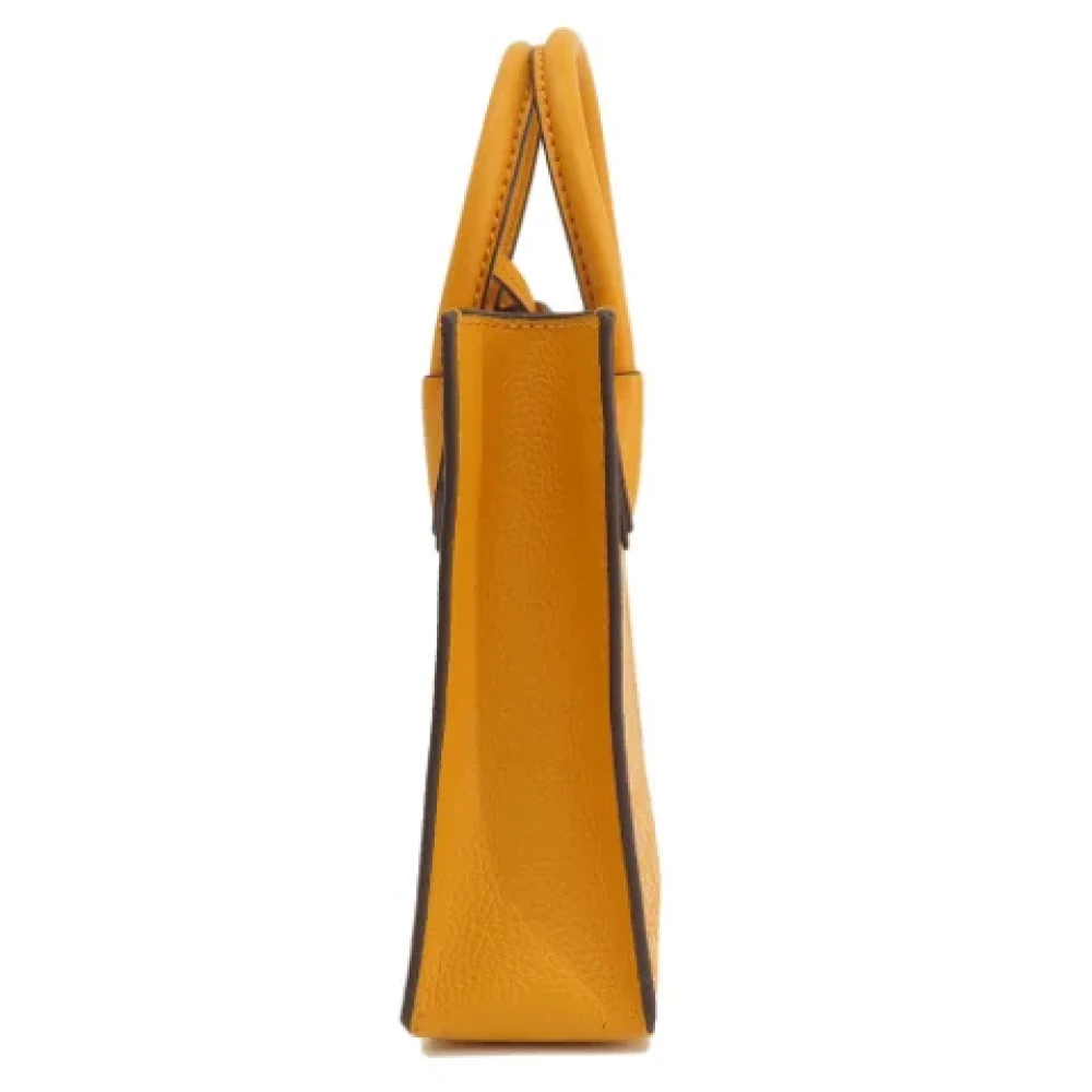 Michael Kors Pre-owned Canvas handbags Yellow Dames