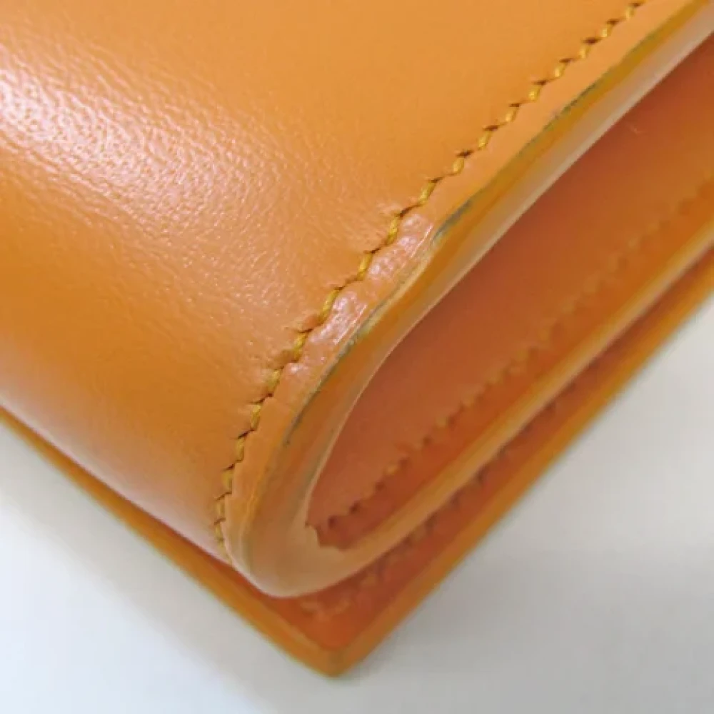 Yves Saint Laurent Vintage Pre-owned Leather wallets Orange Dames
