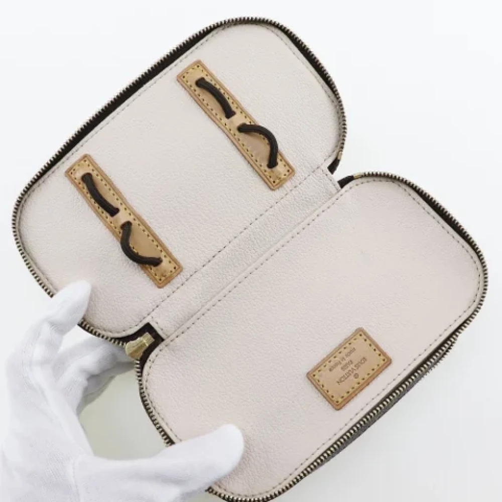 Louis Vuitton Vintage Pre-owned Canvas pouches Brown Dames