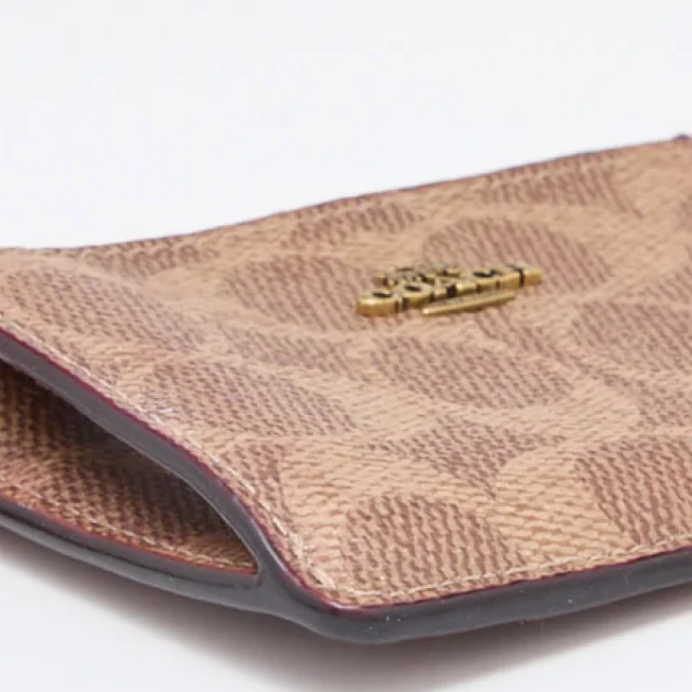 Coach Pre-owned Coated canvas wallets Brown Dames