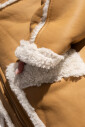 manteau-en-peau-lainee-avec-poches
