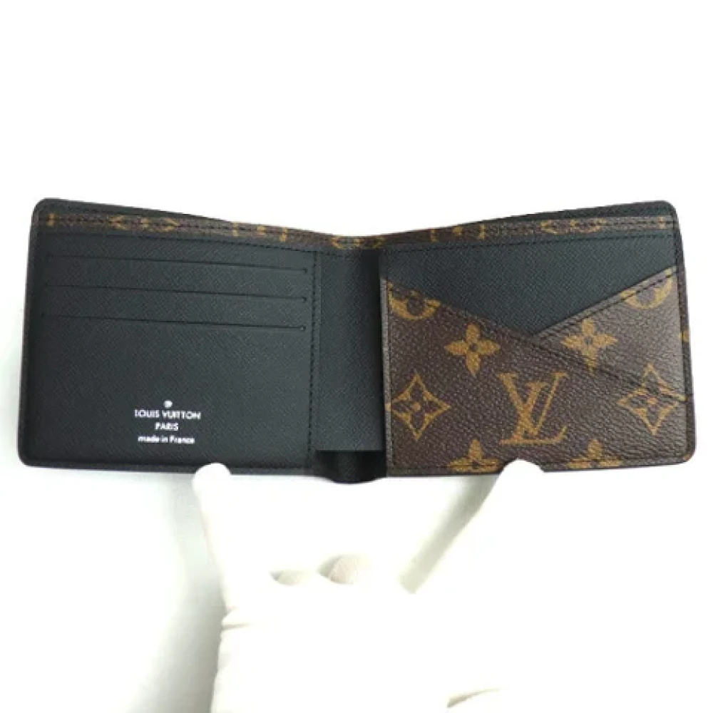 Louis Vuitton Vintage Pre-owned Fabric wallets Brown Heren