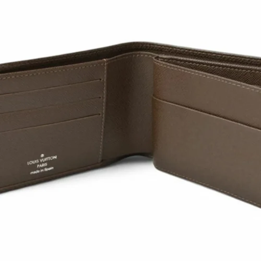 Louis Vuitton Vintage Pre-owned Leather wallets Brown Heren