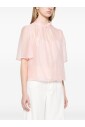 pink-shirt-with-keyhole-detailing