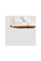 white-leather-sneakers-with-orange-sole
