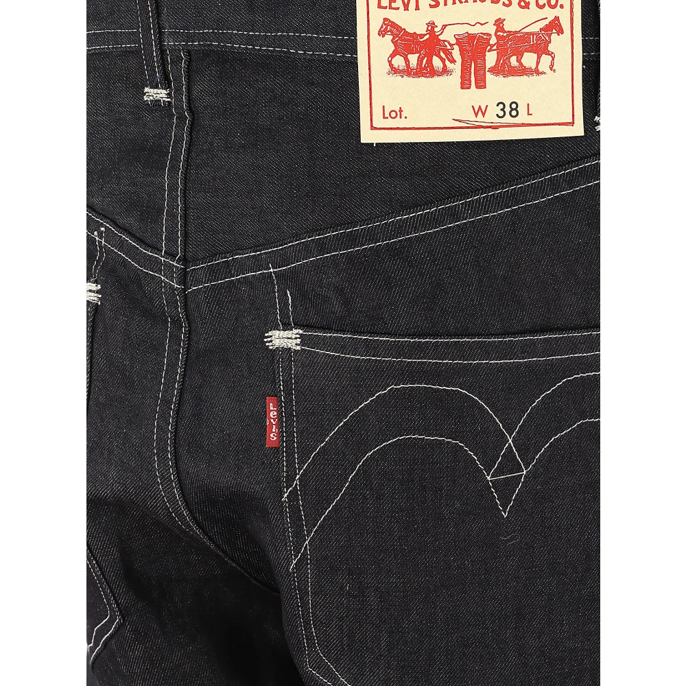 Junya Watanabe Blauwe Jeans met Knoopdetail en Grote Zakken Blue Heren