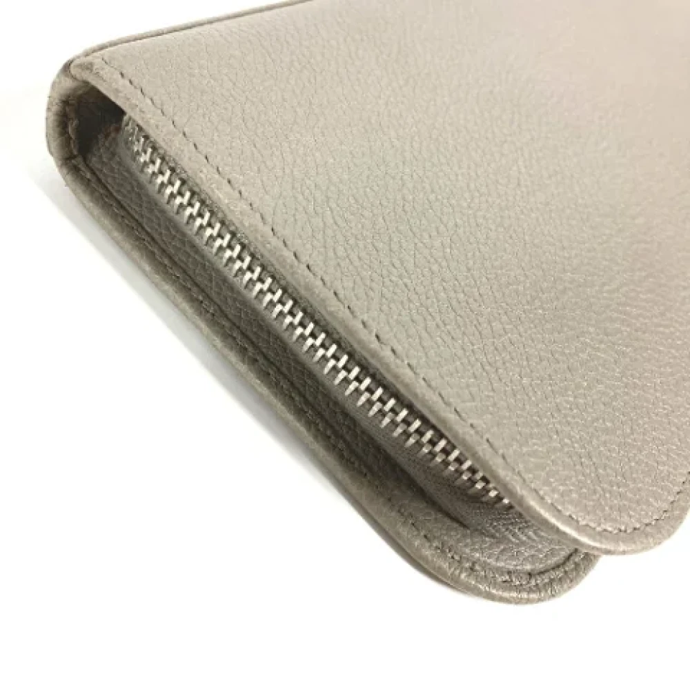 Yves Saint Laurent Vintage Pre-owned Leather wallets Gray Dames