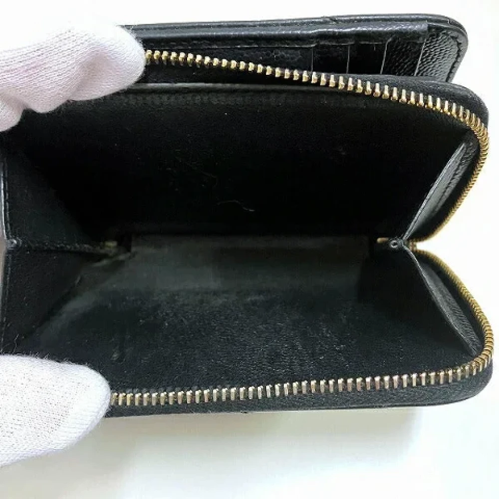Yves Saint Laurent Vintage Pre-owned Leather wallets Black Dames
