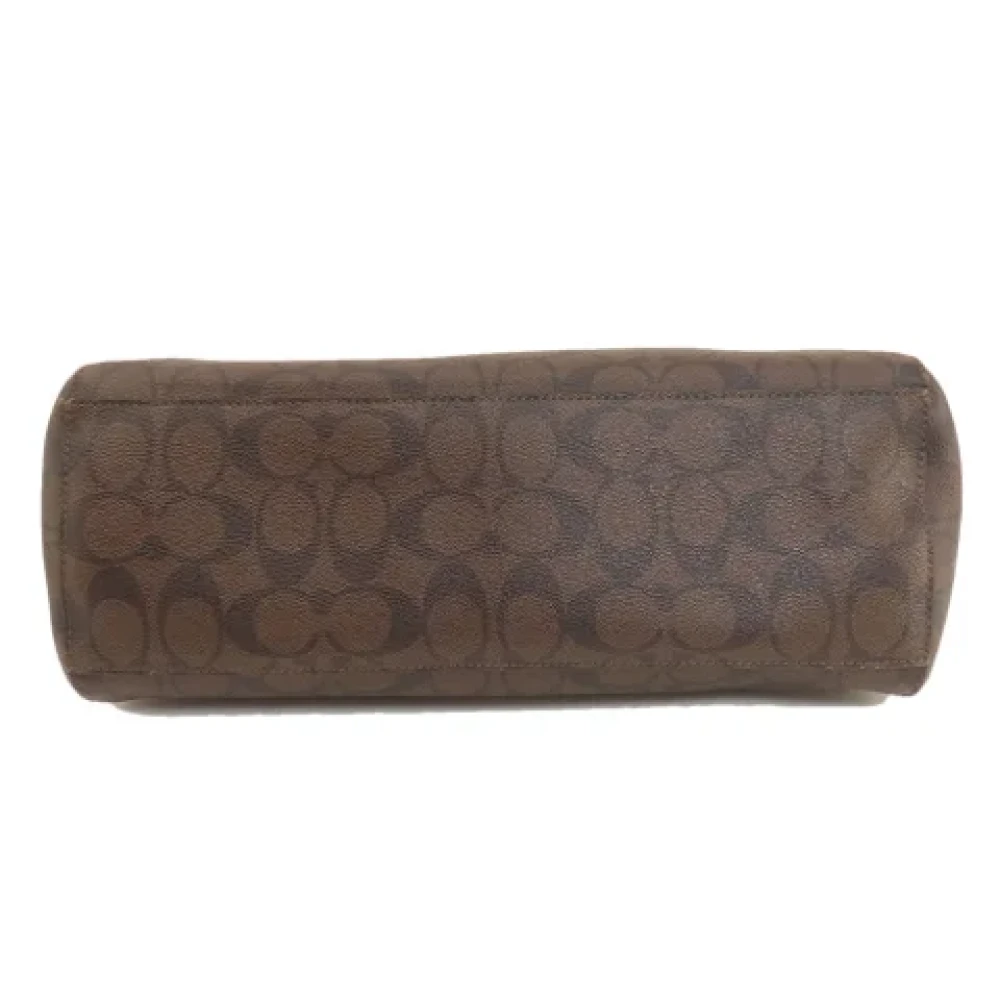 Coach Pre-owned Plastic shoulder-bags Brown Dames
