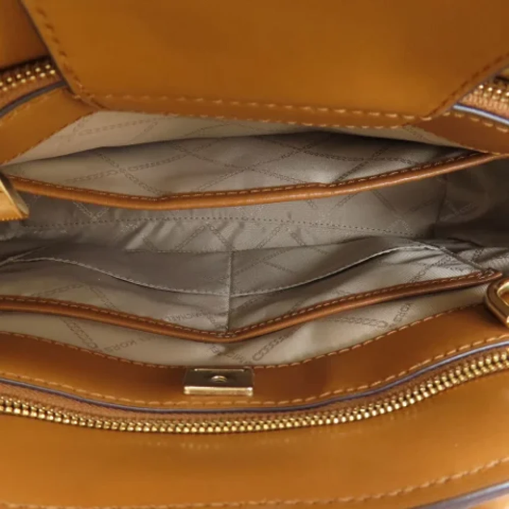 Michael Kors Pre-owned Plastic handbags Brown Dames