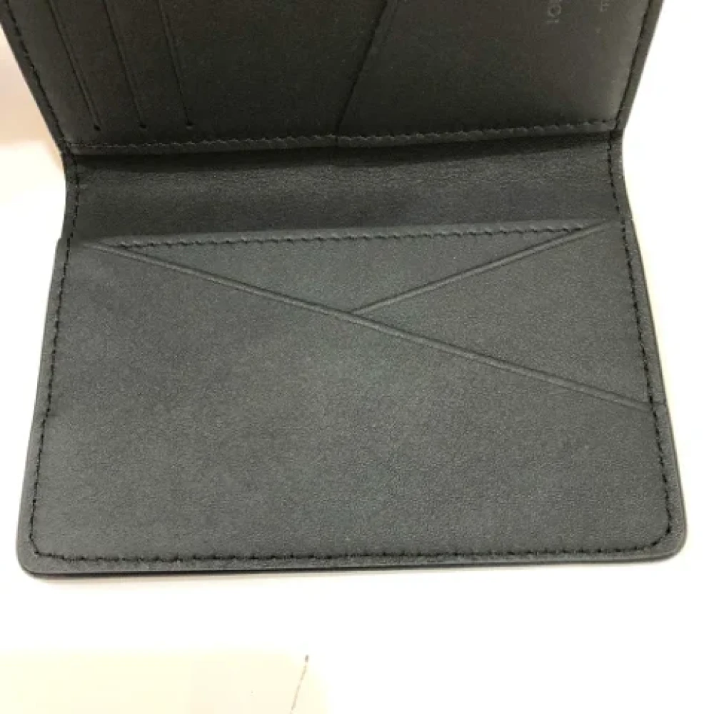 Louis Vuitton Vintage Pre-owned Leather wallets Black Heren