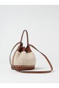 sac-seau-en-shearling-avec-details-rockstud