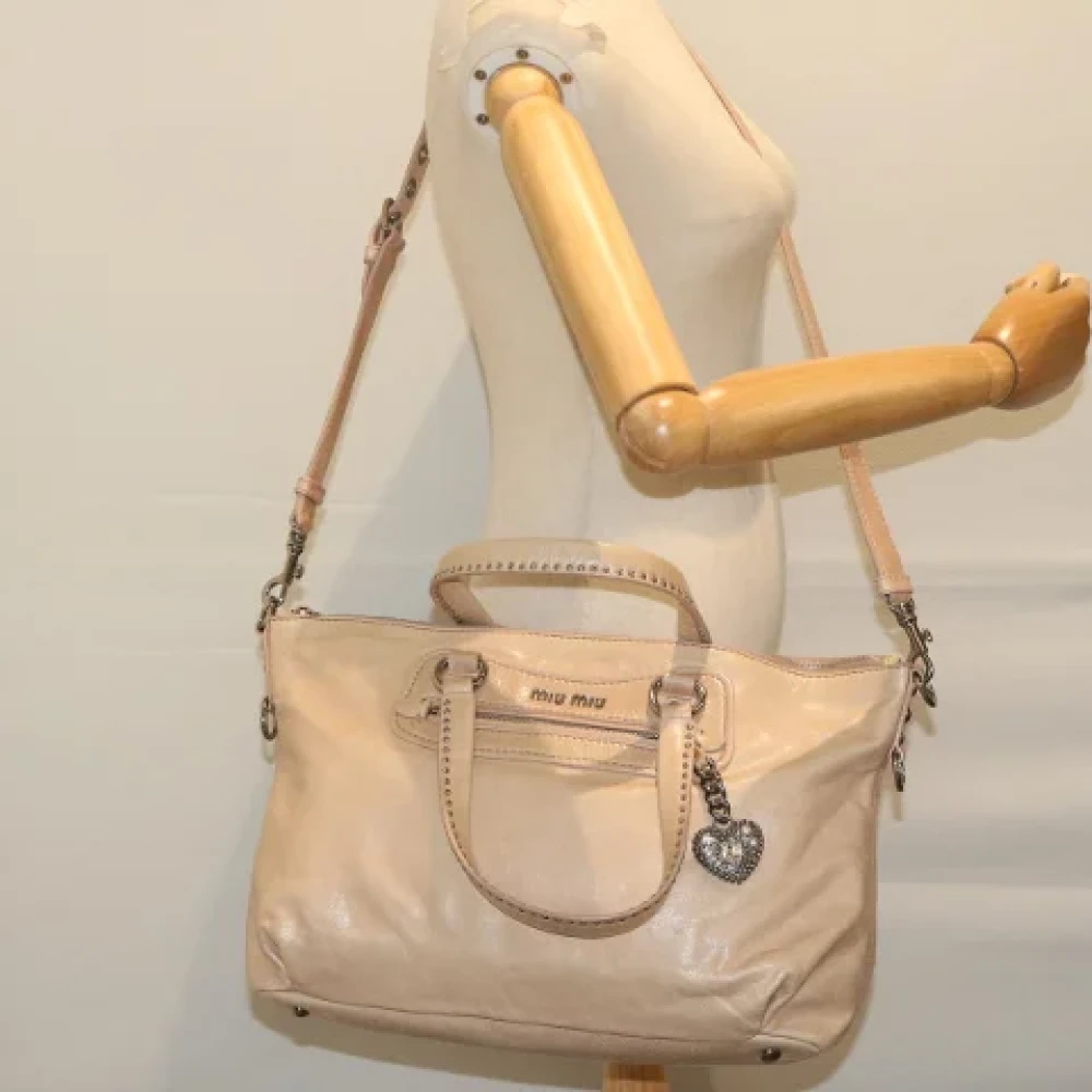 Miu Pre-owned Leather handbags Beige Dames