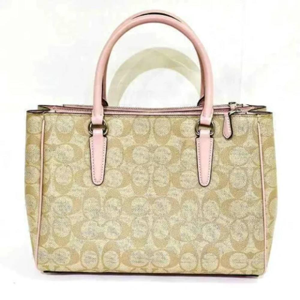 Coach Pre-owned Plastic handbags Beige Dames