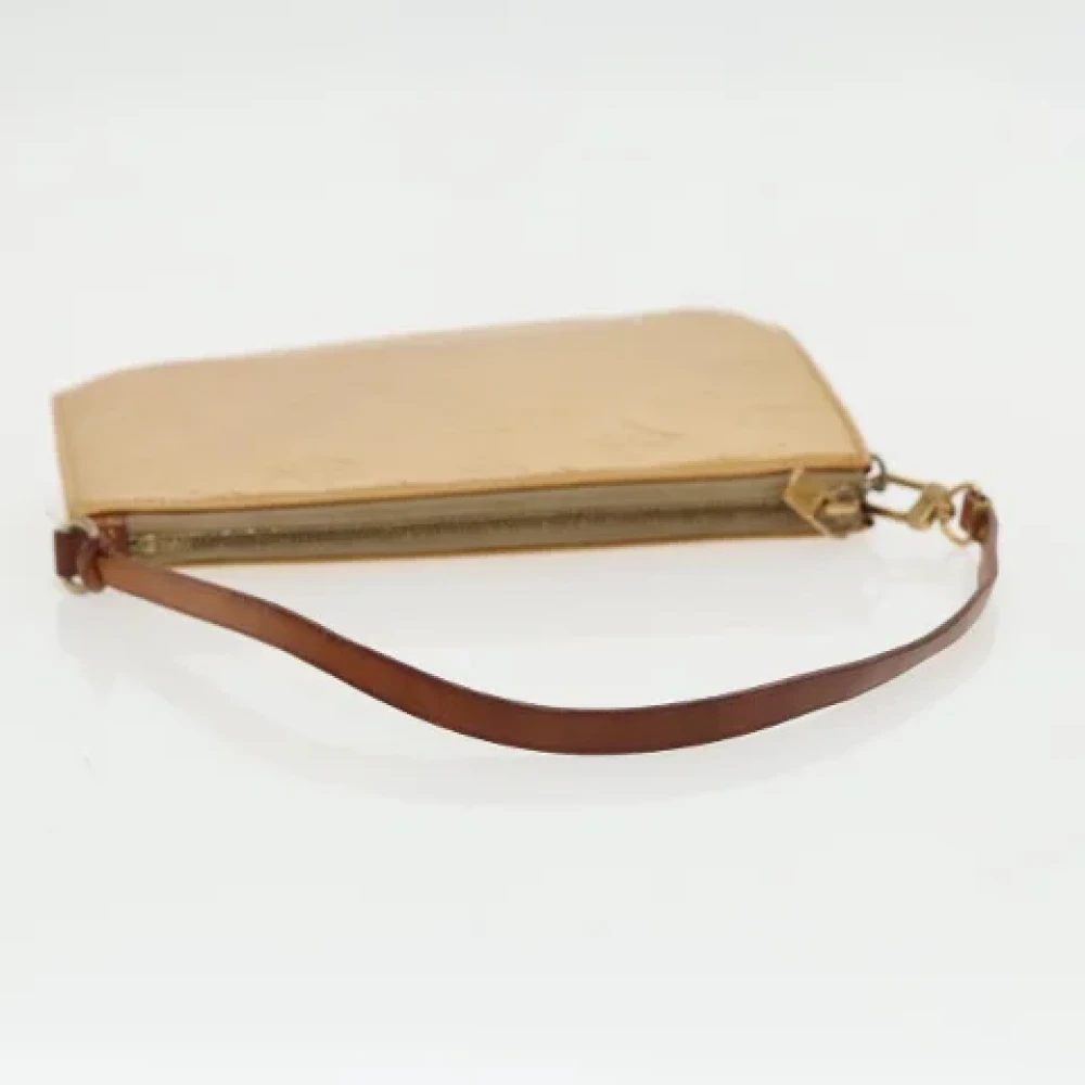 Louis Vuitton Vintage Pre-owned Leather pouches Beige Dames