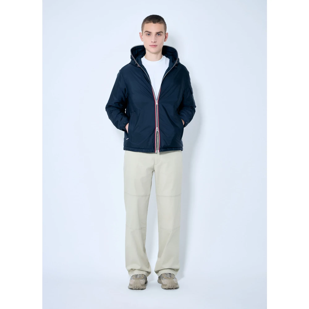 Moncler Waterafstotende gewatteerde jas met capuchon en afwerking Blue Heren