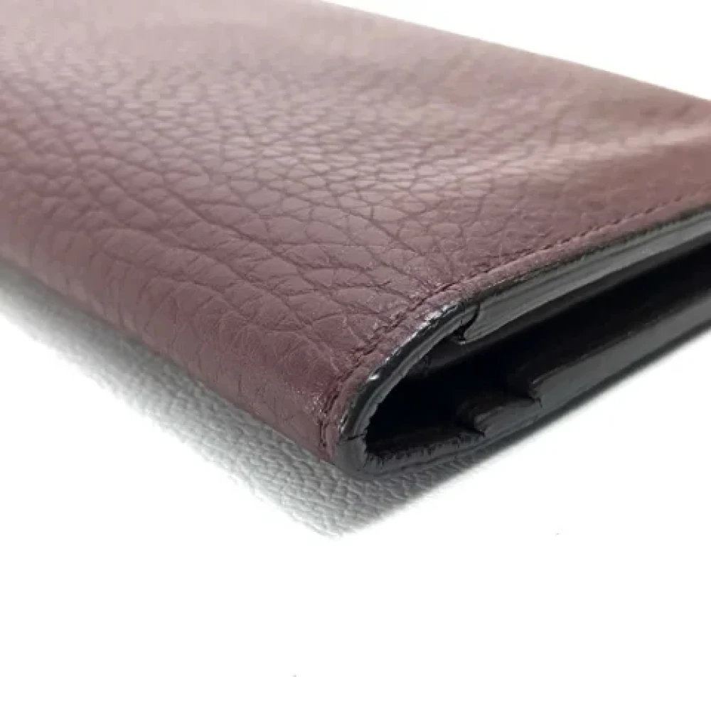 Louis Vuitton Vintage Pre-owned Leather wallets Purple Heren