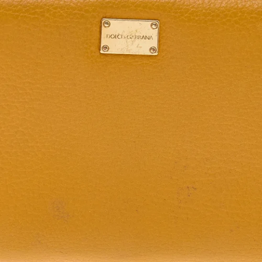 Dolce & Gabbana Pre-owned Leather wallets Yellow Dames