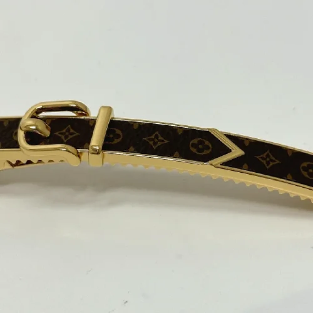 Louis Vuitton Vintage Pre-owned Metal hair-accessories Brown Dames