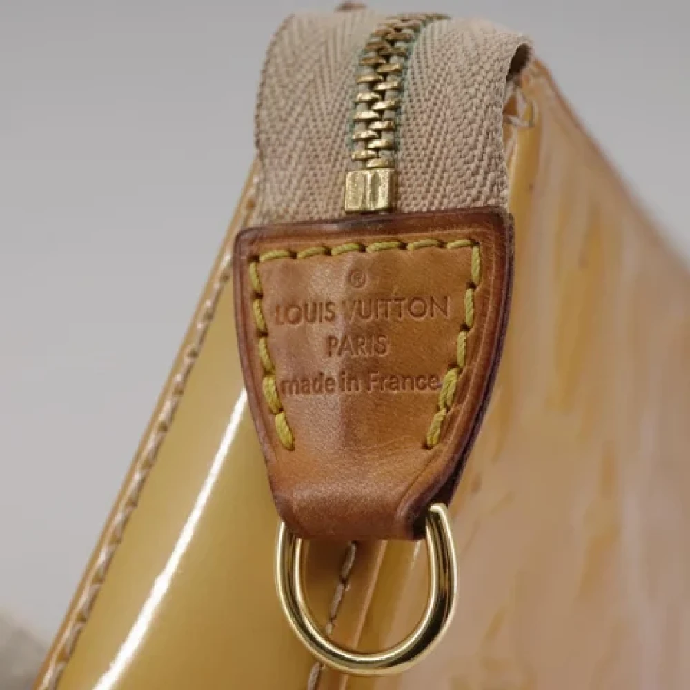 Louis Vuitton Vintage Pre-owned Leather pouches Beige Dames