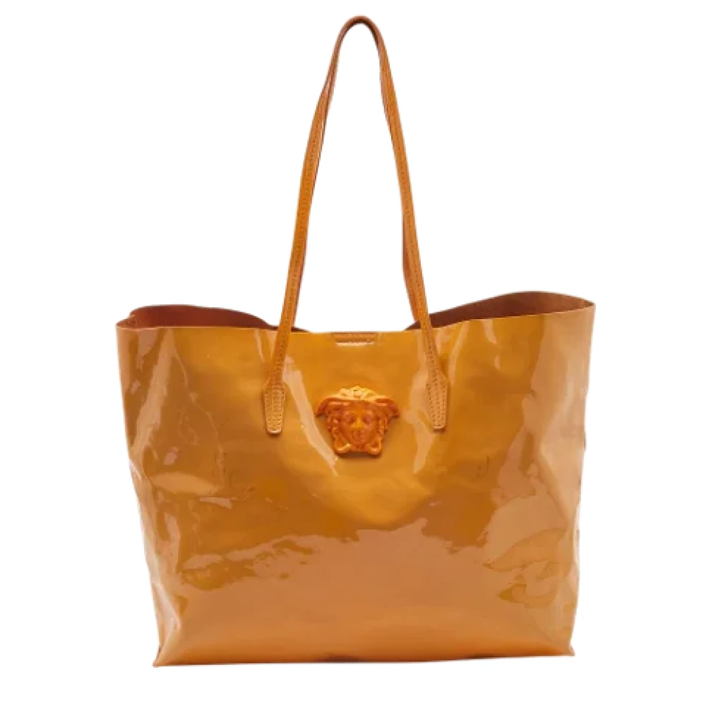 Versace Pre-owned Leather totes Orange Dames