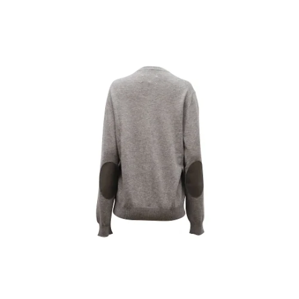 Maison Margiela Pre-owned Wool tops Gray Dames