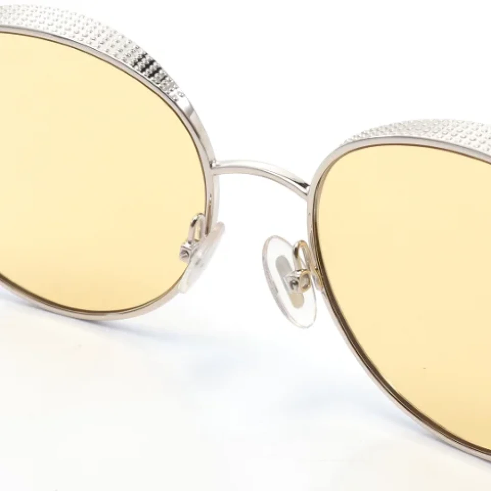 Jimmy Choo Pre-owned Metal sunglasses Gray Heren