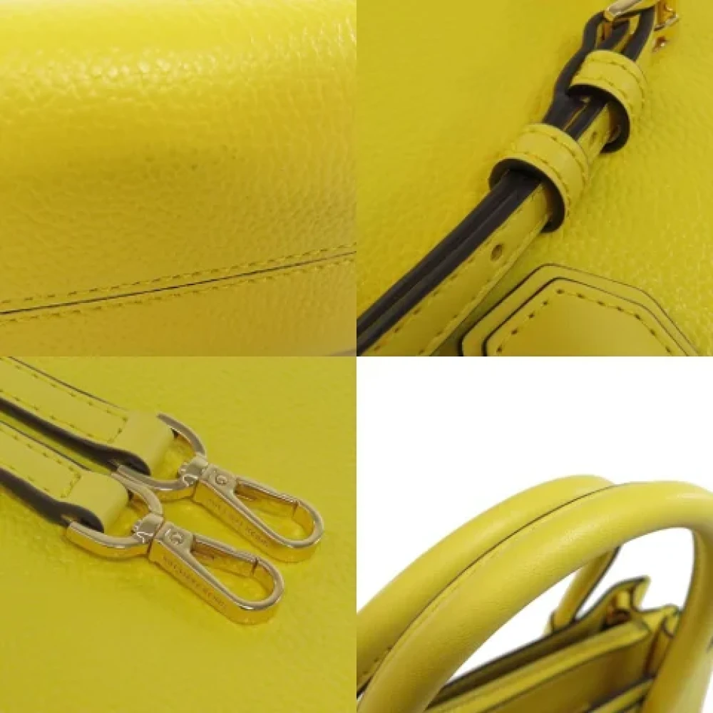 Michael Kors Pre-owned Plastic handbags Yellow Dames