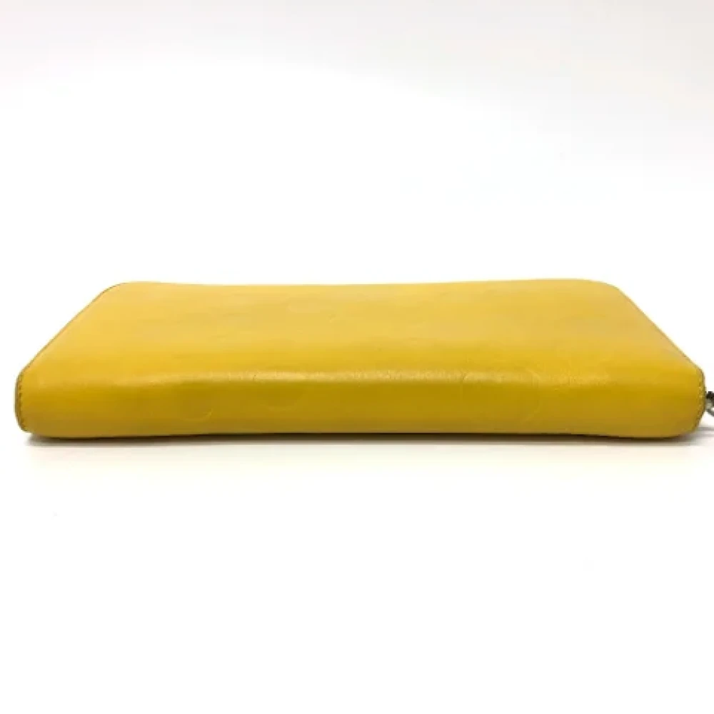 Loewe Pre-owned Leather wallets Yellow Dames
