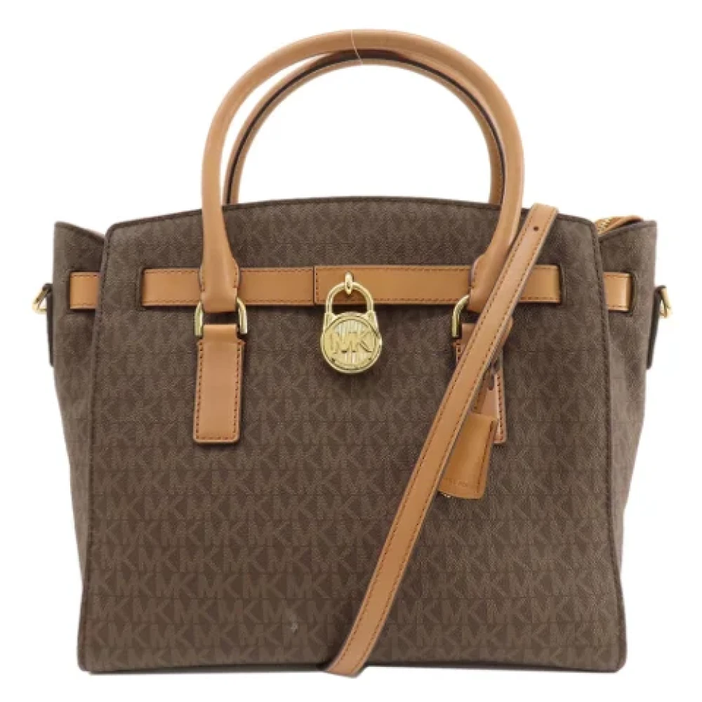 Michael Kors Pre-owned Plastic totes Brown Dames