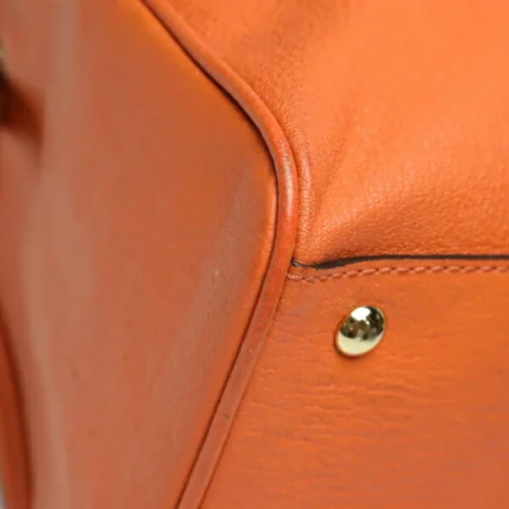 Michael Kors Pre-owned Fabric crossbody-bags Orange Dames