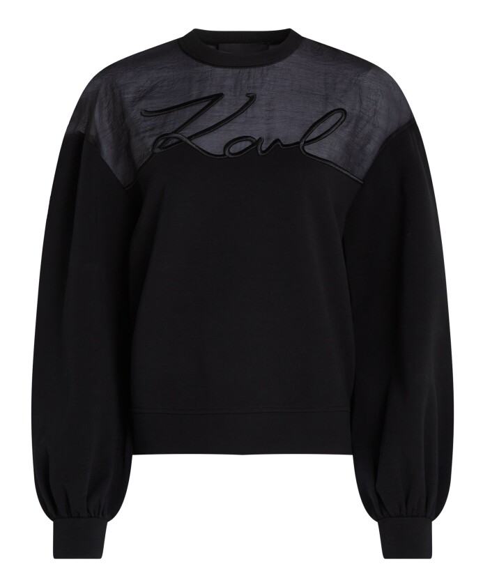 pull-noir-en-materiaux-melanges-avec-broderie
