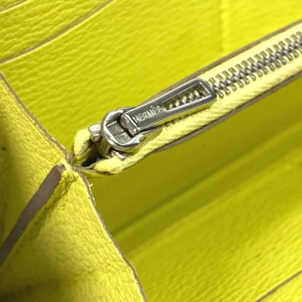 Hermès Vintage Pre-owned Leather wallets Yellow Dames