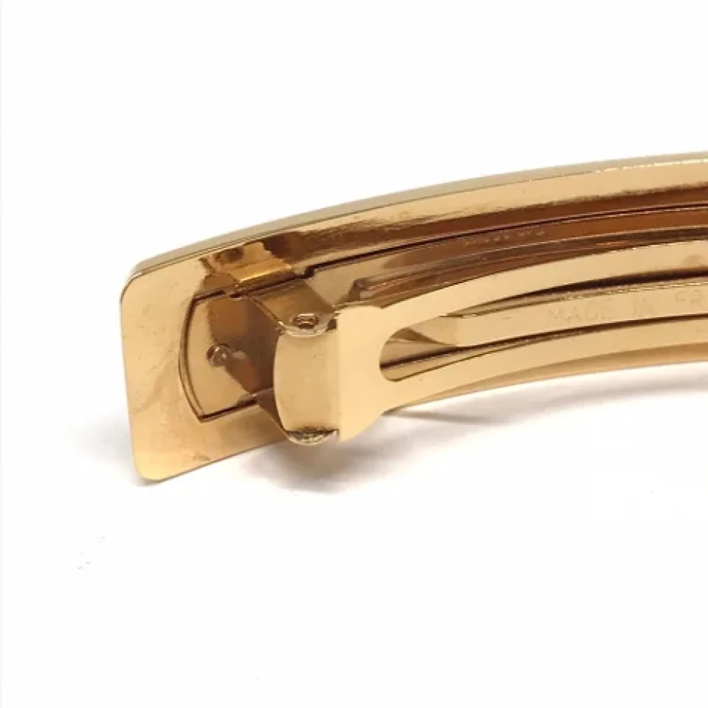 Chanel Vintage Pre-owned Metal hair-accessories Yellow Dames