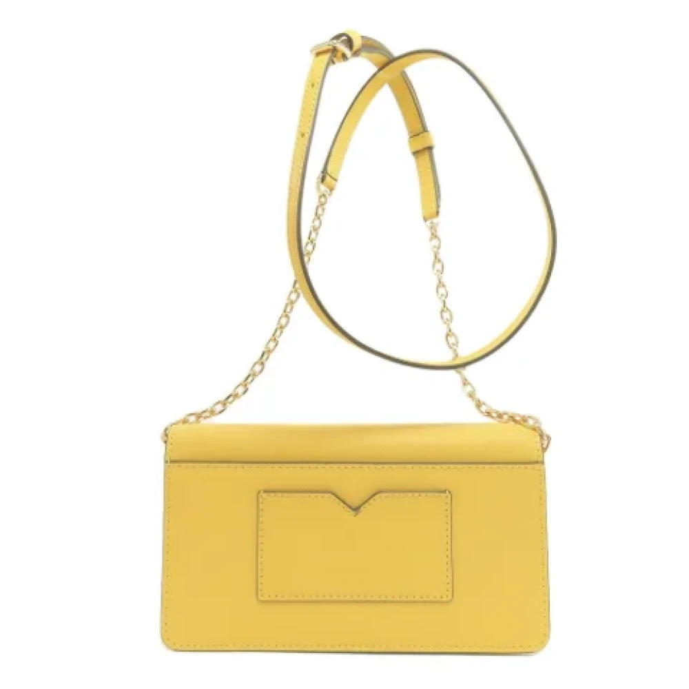 Michael Kors Pre-owned Fabric shoulder-bags Yellow Dames