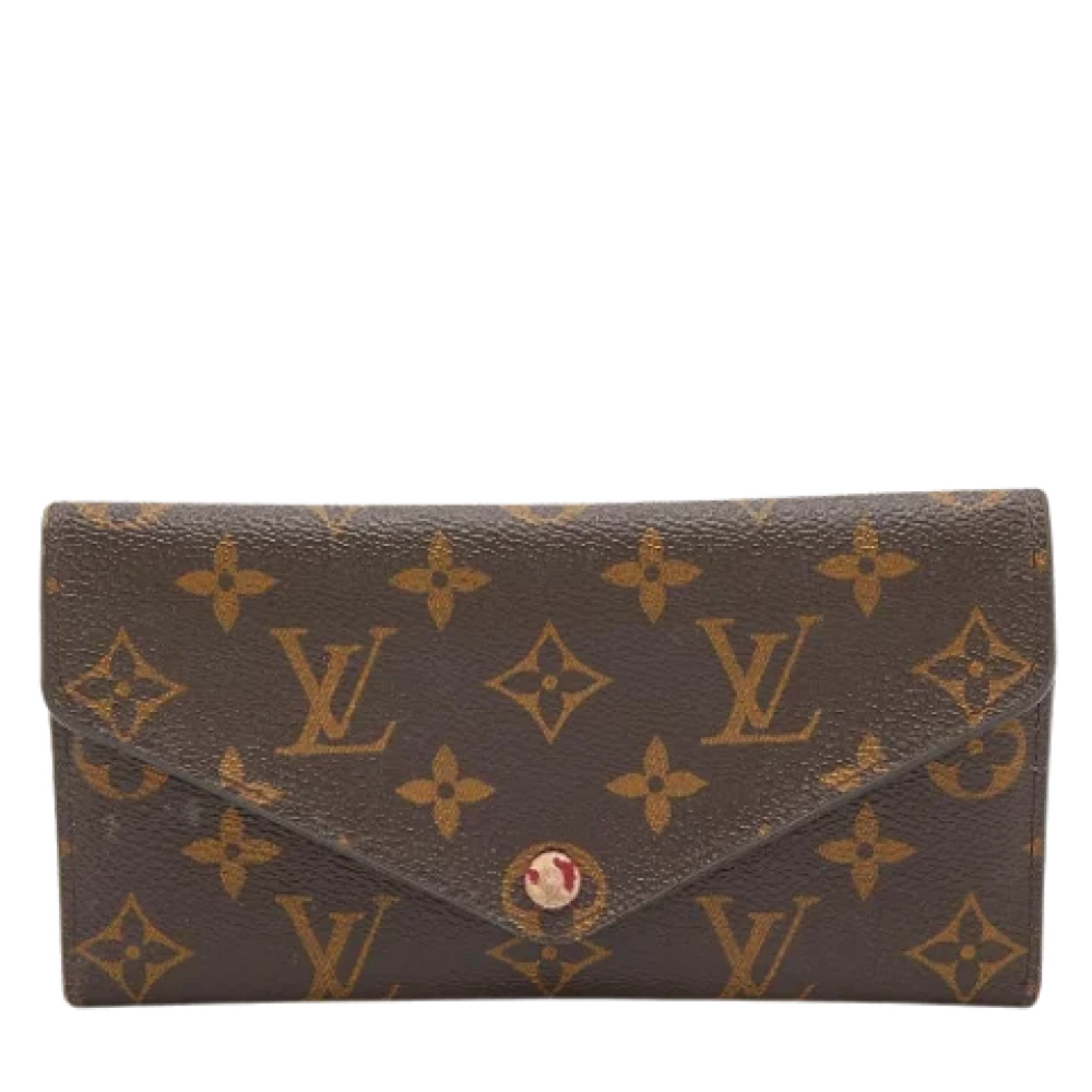 Pre-owned Brunt belagt lerret Louis Vuitton lommebok