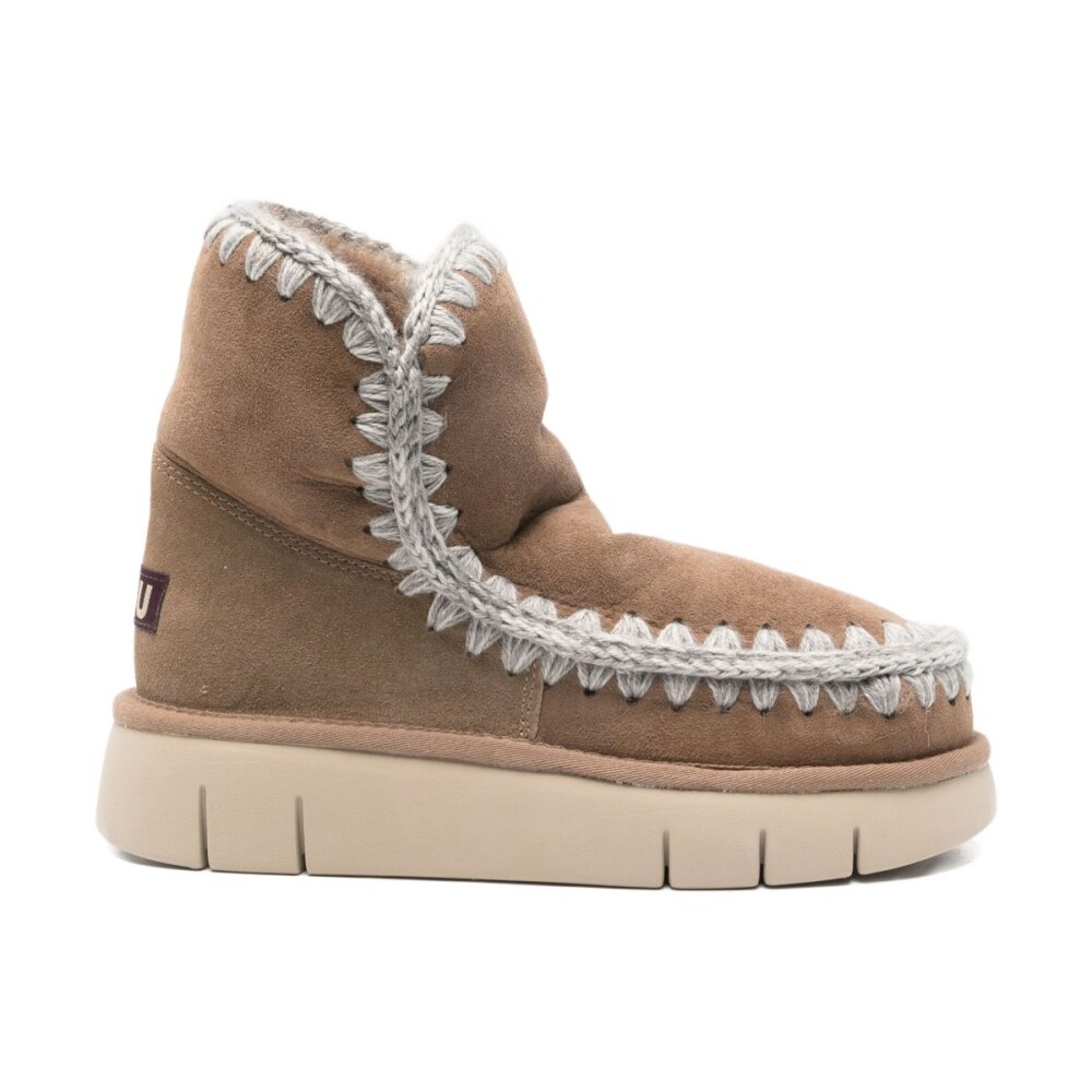 Shop fashion from Mou